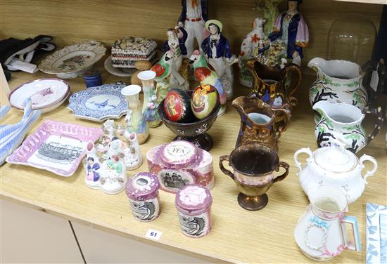 A collection of assorted Victorian and later ceramics, including Staffordshire figures and lustre ware